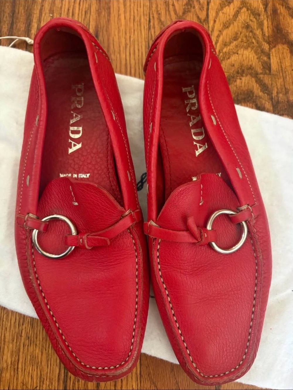 Prada Red Leather Loafers with Silver Ring Accent